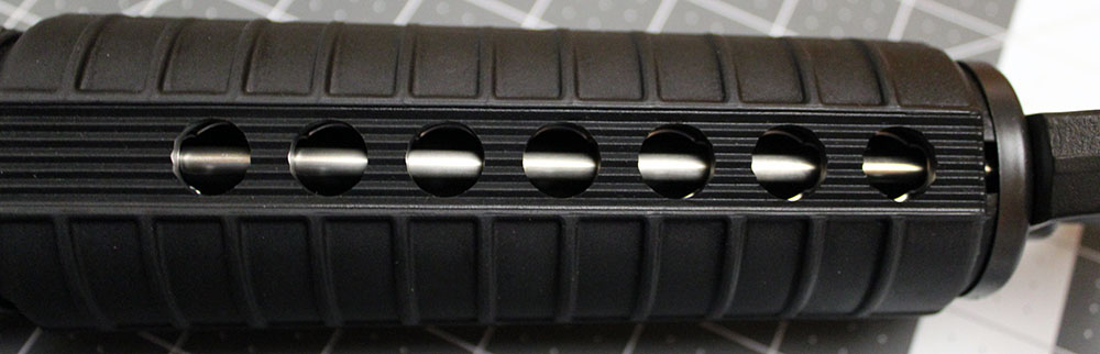 overhead view of AR-15 front hand guard, with gas tube visible through the vents